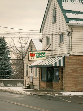Kazs vintage sign on a snowy winter day, Blasdell, New York