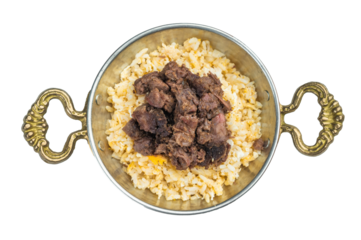 Kawurma qawurma with seared diced meat layered on fluffy pilav, highlighting caramelized surfaces and well-defined grain texture.