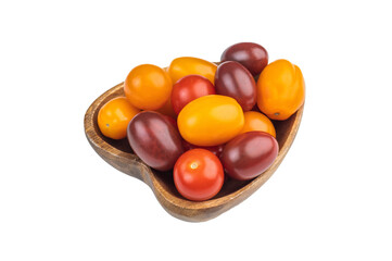 Colorful mix of heirloom cherry tomatoes in a wooden bowl shot overhead on white background, showcasing vibrant fresh produce..
