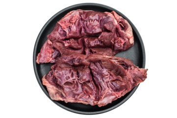 Raw lamb and goat hearts opened to show tender muscle layers ideal for stews braising and rustic nose to tail cooking.