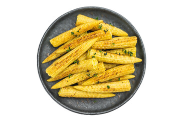 Golden roasted baby corn seasoned and garnished with thyme served in cast iron pan on white background ready cooked vegetable dish