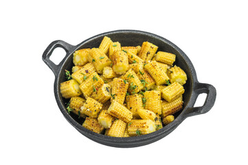 Golden fried baby corn pieces seasoned with spices and thyme served in cast iron skillet on white background top view