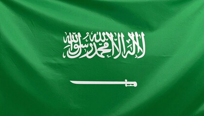 Saudi Arabia flag with green field, white Shahada inscription, and sword symbolizing faith and justice.