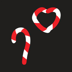 Red and White Striped Candy Canes and Heart Shape on Black