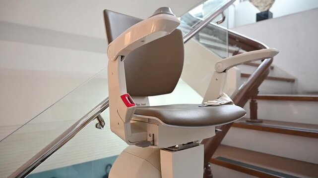 A stair lift installed in the dental clinic to help patients with limited mobility move up and down the stairs