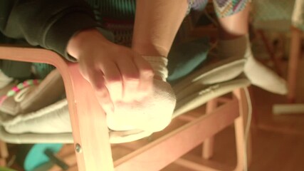 Precise backstage sock placement, Someone finetunes sock position backstage during performance, An individual carefully adjusts sock placement behind scenes during show preparations