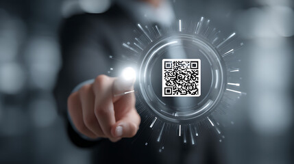 Scanning Innovation: A modern QR code is highlighted by a person with a sense of future innovation. Touching this code shows how technology can connect us.