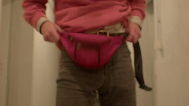 Ensuring all straps are snug and smooth, Carefully fix and fasten waistpack with gentle movements, Methodically adjusting and securing waistbag to ensure comfortable fit and stability