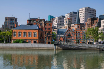 Union church by river with skyline refleciton at Hungpu, Shanghai