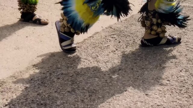 Bright garments against shadowed figures evoke powerful emotional scenes