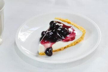 blueberry cheese cake, blueberry cheese tart and hot tea