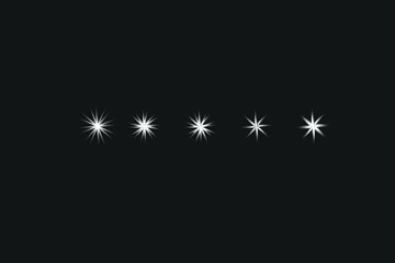 Set of five white starburst light flares with varied ray patterns