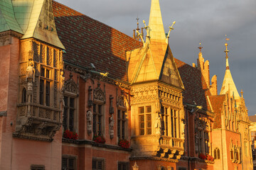 Historic gothic architecture of sunlit medieval european building. The Old Town Hall