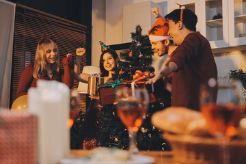 Festive Office Christmas Party with Delicious Food. A beautifully decorated office space with Christmas trees and festive lights, set up for a holiday party.