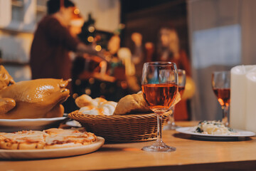 Festive Office Christmas Party with Delicious Food. A beautifully decorated office space with Christmas trees and festive lights, set up for a holiday party.