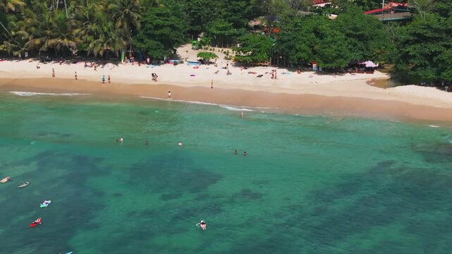 Aerial View of Hiriketiya Bay with surfers, Sri Lanka