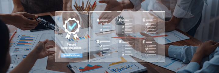 A business team celebrates their achievement with a certificate in a modern office. Progress charts...
