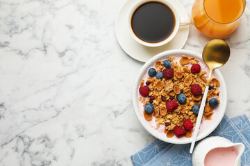 Tasty breakfast. Granola with yogurt and fruits served on white marble table, flat lay. Space for text