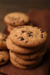 Yummy chocolate chip cookies on table, closeup
