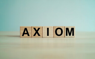 Axiom Word Spelled on Wooden Blocks on Table Concept