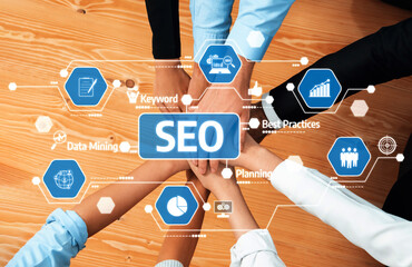 A group of diverse professionals collaborates on a digital marketing strategy, using SEO practices to enhance team dynamics and drive business growth effectively. Amity