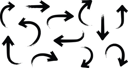 Obraz premium Set of Black Hand Drawn Brush Stroke Arrows Showing Various Directions Isolated on Transparent Background