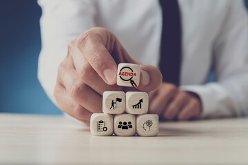 Agenda meeting appointment activity information concept. List of meeting activities in the order to be taken up, beginning with the call to order, ending with adjournment. Wooden cubes background