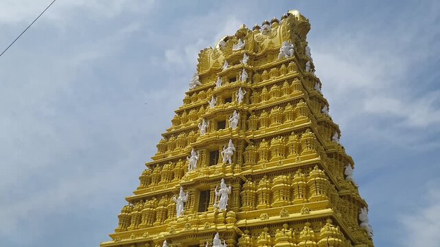 A close-up view of the Sri Chamundeshwari Temple Gopuram, dedicated to a fierce form of Shakti.