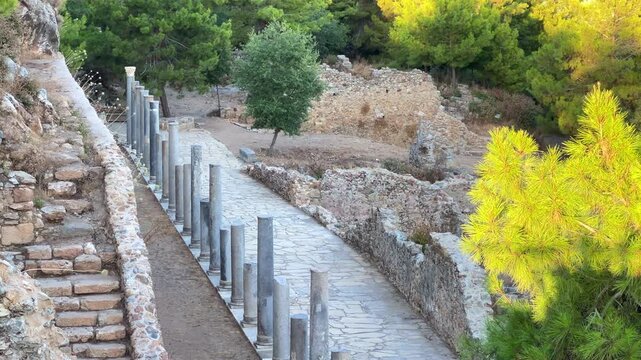 Ruins of the ancient Roman port city of Siedra in Alanya, Antalya, Turkey. The street and ruins of the ancient abandoned ancient city of Siedra on the Mediterranean coast. 4К