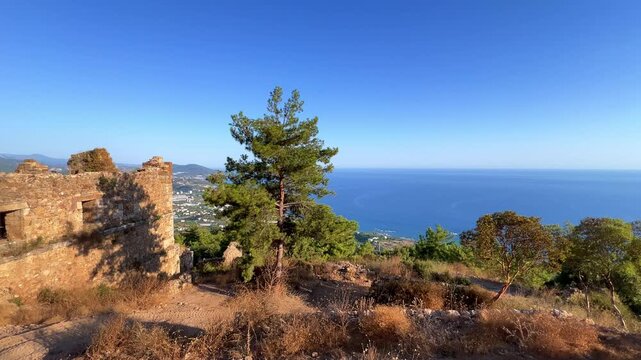 Ruins of the ancient Roman port city of Siedra in Alanya, Antalya, Turkey. The street and ruins of the ancient abandoned ancient city of Siedra on the Mediterranean coast. 4К