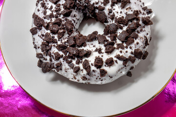donut with chocolate icing and sprinkles