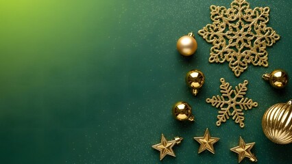 Fototapeta premium Gold ornaments and snowflake decorations arranged on a dark green background