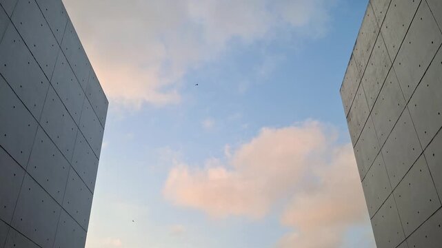 Modern Architecture Skyline View | Minimalist Concrete Buildings and Soft Sky Clouds
