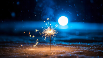 A dazzling sparkler ignites the snowy winter night, its golden sparks contrasting with a magical blue bokeh background.