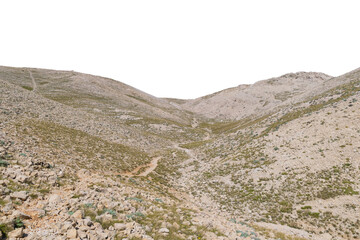 Rugged mountain path in arid rocky landscape. Isolated object.