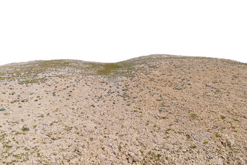 Arid rocky landscape with sparse vegetation on clear day. Isolated object.