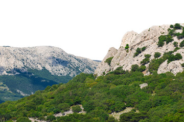 Majestic mountain landscape with rocky peaks and lush forest. Isolated object.
