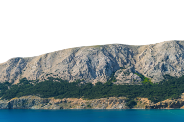 Majestic coastal cliff with lush greenery and clear blue sea. Isolated object.