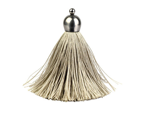 Metal and beige tassel with transparent background