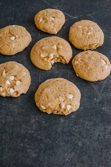 White Chocolate Chip cookies on a dark background