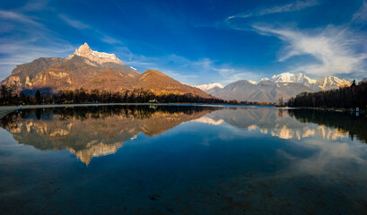 Sunset at Lac de Passy lake in Domancy, France in winter