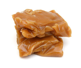 Caramel candies isolated on white background
