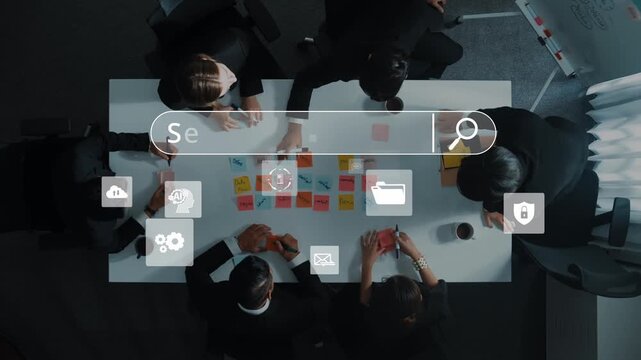 Aerial view of a diverse business team in a meeting room, utilizing digital tools and a search interface to enhance collaboration and innovation in a modern workspace. Raster