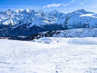 Mountains and skiing in Les Contamines, French alps.