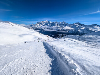 Mountains and skiing in Les Contamines, French alps.