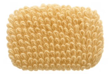 Yellow looped terrycloth towel textile texture creating a soft, absorbent background for hygiene and comfort, transparent background
