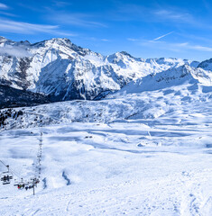 Mountains and skiing in Les Contamines, French alps.