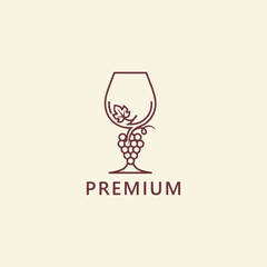 Premium wine logo with elegant glass, grapes, and leaf design.