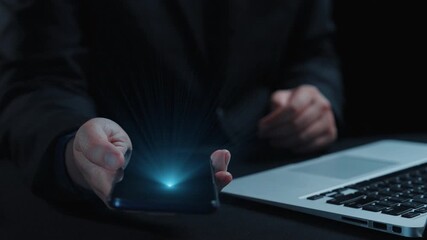 A businessman showcases a smartphone displaying a financial chart with a bright upward arrow, symbolizing digital success and market growth in a tech-driven world. Qubit - Powered by Adobe