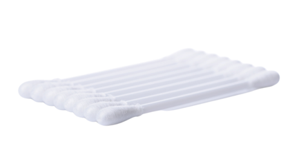 Arrangement of several white cotton swabs or cotton buds lying parallel to each other in a neat row formation clean white background cutout